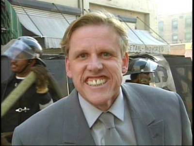 Gary Busey fists horses.