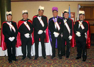 C'mon, we gave him the Knights of Columbus. Isn't that enough? If people dressed like this in my honor, it would be enough for me. Too much, in fact.