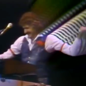 Dennis DeYoung, who's into perms, arm garters, and LSD.